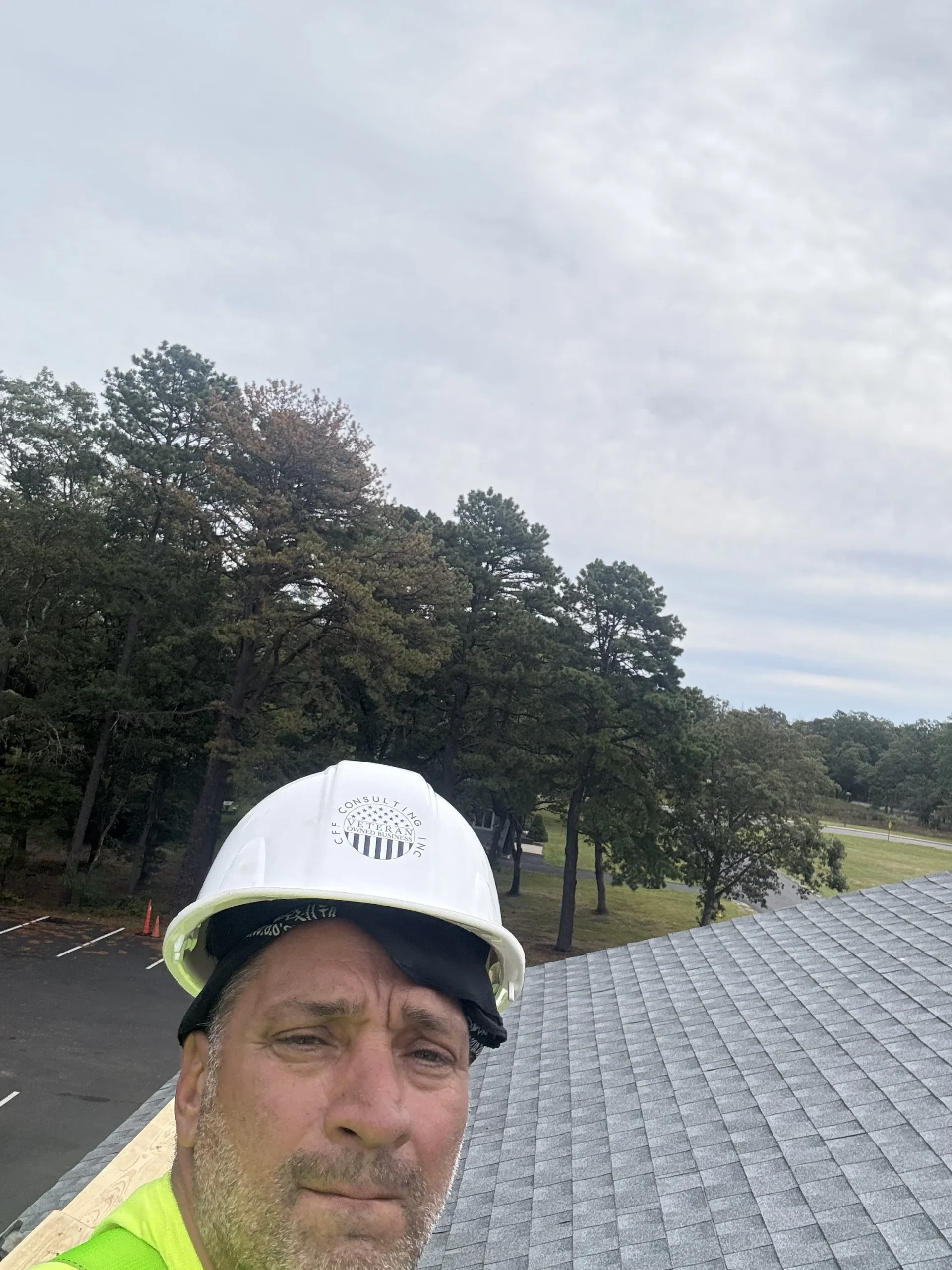 Worker with rooftop view at Brookhaven