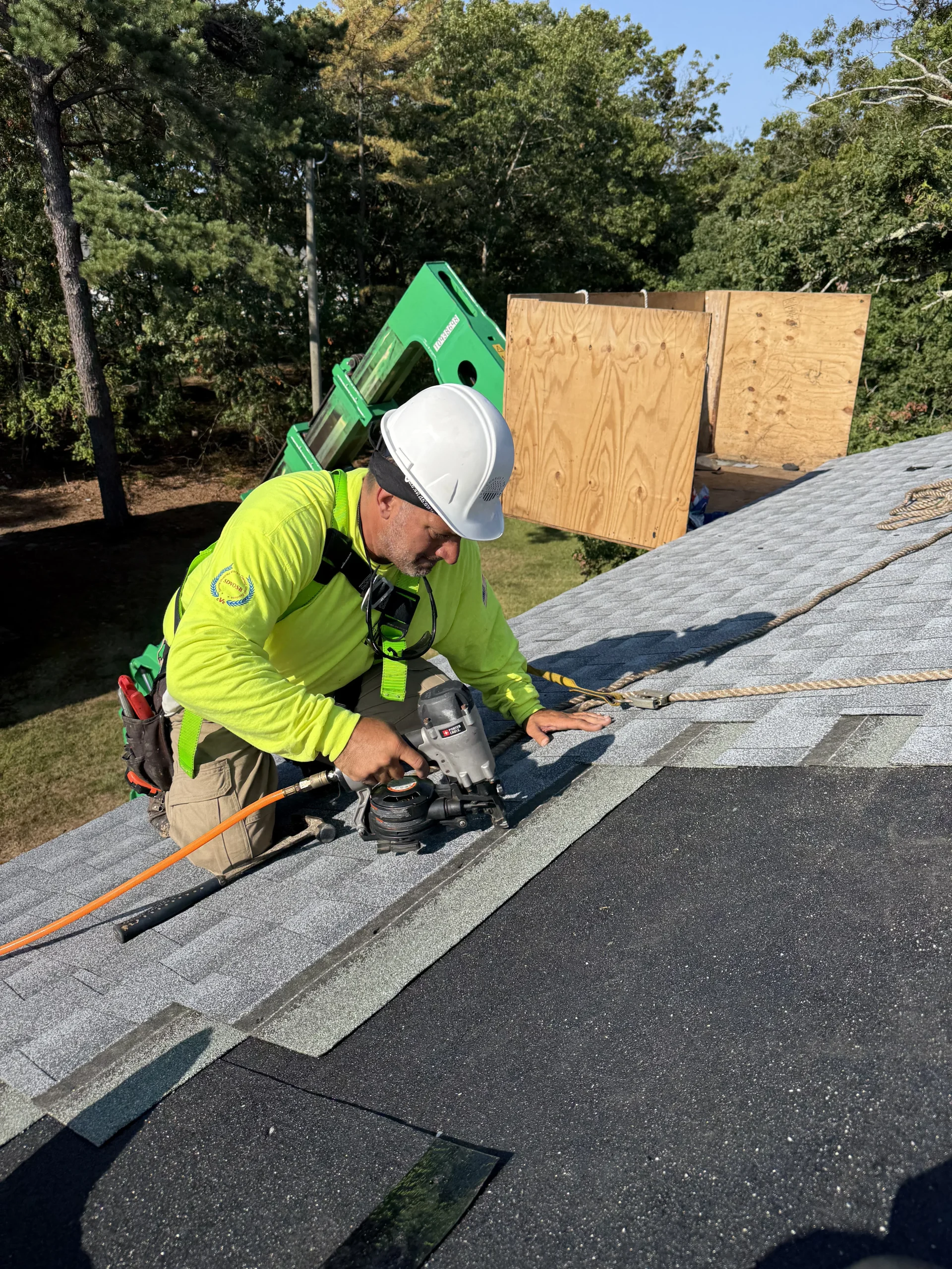 Roofer on roof at Brookhaven