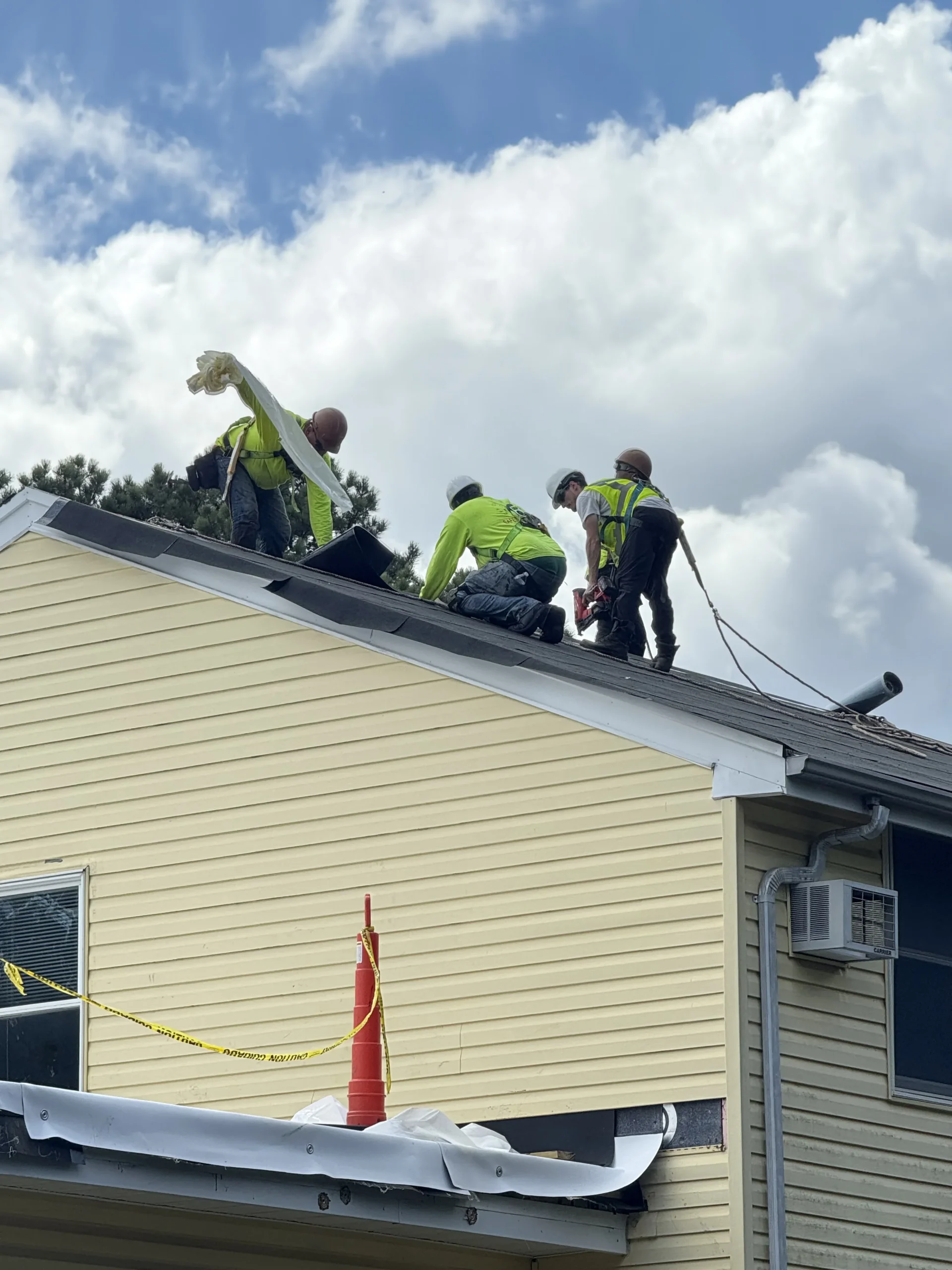 Roofers working at Brookhaven